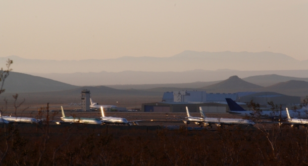 Mojave Airport. White Knight Two sits on the runway next to the control tower.
